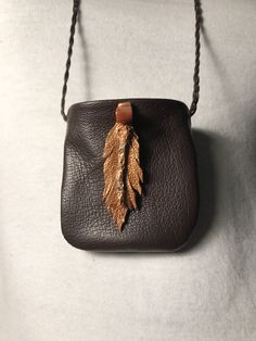 One of a kind hand sculpted leather feather neck pouch, Medicine Bag, Crystal sack pouch, Keepsake, Special Pouch, Shirlbcreationstoo Everyday Use Brown Pendant Jewelry, Brown Pendant Jewelry For Everyday Use, Artisan Leather Necklace For Everyday, Handmade Brown Jewelry For Everyday Use, Artisan Hand Tooled Jewelry, Unique Handmade Necklaces For Everyday Use, Unique Handmade Necklace For Everyday Use, Handmade Brown Necklaces For Everyday Use, Handmade Brown Necklace For Everyday