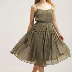 Size 4. Nwot. Olive Green. Tiered. Pleated Upper. Chiffon Type Material. Lined. Back Zip. Approx Measurements: Pit To Pit: 14”. Waist: 13.5”. Length: 46” Smoke Free Home. Offers Welcome! Chic Chiffon Midi Dress For Daywear, Chiffon A-line Sundress, Pleated Sundress Midi Dress For Brunch, Chic Pleated Chiffon Dress, Chic Pleated Chiffon Summer Dress, Knee-length Chiffon Day Dresses, Daywear Knee-length Chiffon Dresses, Chiffon Midi Dress For Date Night, Pleated Midi Length Chiffon Dress