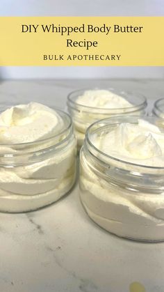 three jars filled with whipped body butter sitting on top of a white counter next to a yellow sign that says diy whipped body butter recipe