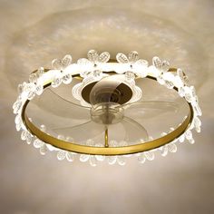 a chandelier hanging from the ceiling in a room