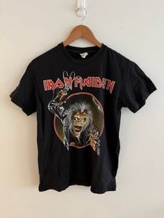 Vintage Iron Maiden t-shirt. Tagged M, fits like mens S/M. Excellent vintage condition, but please see photos. Comes from a smoke- and pet-free home. **Measurements** Pit to pit - 18.5 inches Top of the collar down the back center - 25.75 inches *Please note: Vintage and pre-owned items will have small imperfections due to age and wear. I do my best to reflect those in the images and description. All sales are final. Iron Maiden T Shirt, Music Tees, Vintage Iron, Iron Maiden, Im Not Perfect, Adult Outfits, Tops & Tees, T-shirt, Top Outfits