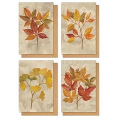 four framed paintings with leaves on them