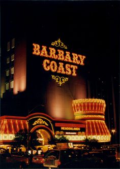 the barbary coast hotel and casino in las vegas is lit up at night