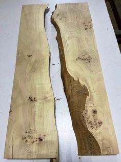 two pieces of wood that have been cut in half