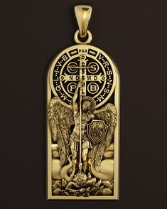 a gold medal with an angel holding a cross and two wings on the front of it