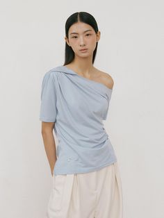 This is a minimal and feminine top by Lucirzu that is made out of high quality and sturdy material. With distinctive mood of the design and comfortable wear, you can use it for your daily lifestyle.- Natural drape and feminine look- Shirring detail on the waistline- Modern and minimal mood Versatile Tops With Relaxed Fit For Everyday, Relaxed Fit Versatile Top For Everyday, Versatile Relaxed Fit Top For Everyday, Modern Tops For Loungewear, Modern Relaxed Fit Tops For Loungewear, Versatile Cotton Tops For Loungewear, Light Blue Fitted Top For Loungewear, Versatile Blue Top For Loungewear, Modern Stretch Tops For Everyday