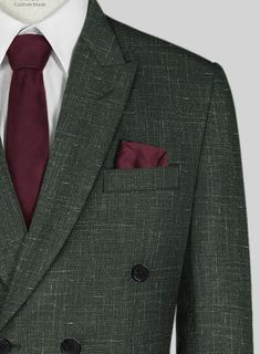 Looking for a suit that will make you feel sharp, polished and sophisticated, then you should go for our Italian Murano Bottle Green Wool Linen Double Breasted Suit. Crafted from a premium blend of wool, linen and silk, the texture on the green hue makes the suit especially versatile as well as will raise your interest level.   Look Includes  Italian Murano Bottle Green Wool Linen Fabric  Double Breasted Jacket Style  Peak Lapel  Horn Royal Black Buttons  Single Vent  Three Cuff Buttons  Two welted back pockets on trousers   You can change the look during customization if required.  Lining: Viscose; Dry Clean. Grey Wool Suit, Blue Linen Shirt, Brown Corduroy Jacket, Cashmere Jacket, Green Suit, Tweed Suits, Tuxedo Shirts, Custom Suit, Peak Lapel