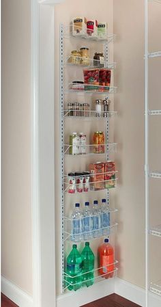 the pantry shelving is organized with clear shelves