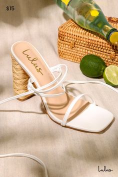 Put a bow on any summer outfit with the Lulus Cordell White Espadrille High Heeled Sandals! These stunning heels are formed by smooth faux leather, which shapes a slender single toe strap, square toe bed, and matching vamp strap. Long ties (with gold aglets) begin just below the vamp strap, echoing the shape before looping around and tying above the ankle. A sky-high espadrille-wrapped bock heel finishes the look. 4. 5" block heel. Cushioned insole. Rubber sole has nonskid markings. Man made mat White Open Toe Straw Heels, White Lace-up Sandals With Wrapped Heel For Beach, White T-strap Sandals With Heel Strap And Open Toe, White Synthetic Lace-up Sandals With Heel Strap, White T-strap Sandals With Buckle Closure And Open Heel, Stunning Heels, White Espadrilles, High Heeled Sandals, Sandals Strappy