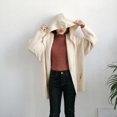 Loose Cardigan Knitted Hooded Style – Tomscloth Beige Knit Hoodie For Fall, Cream Hooded Sweater For Spring, Beige Knit Outerwear For Winter, Hooded Knit Sweater Coat, Oversized Knitted Hoodie For Fall, Oversized Knit Hoodie For Spring, Cream Hooded Sweater For Fall, Hooded Cream Sweater For Fall, Hooded Knit Sweater For Winter