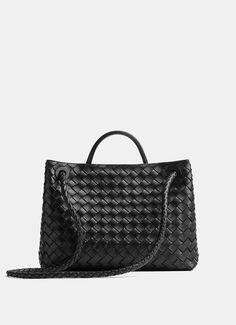 Intrecciato leather bag by Bottega Veneta with single compartment, magnetic closure and metallic top handle crafted by artisans that showcases nuances and engraved markings making each piece unique. Unlined. Made in Italy. Dimensions: 12 x 20 x 2,5 cm approx. Andiamo Bag, Womens Designer Bags, Medium Bag, Bottega Veneta Intrecciato, Sneaker Jewelry, Black Shop, Eyewear Womens, Designer Shoulder Bags, Wallet Bag