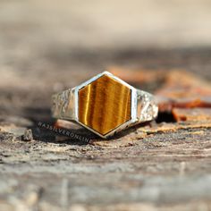 Tiger's Eye Ring, Hexagon Ring, 925 Sterling Silver Ring, 'Until The End' Ring, Handmade Ring, Silver Ring, Friendship Ring, Men/Women Ring Engraving on Ring : Until The End Metal: 925 Sterling Silver Gemstone : Tiger's Eye Stone Color : Yellow Stone Shape : Hexagon Stone Setting: Bezel Benefits of Tiger's eye:- In the home space and balancing Feng Shui vibes, the Tiger's Eye gemstone is also known for keeping moods grounded, attracting good luck, and dispelling fears Benefits of wearing silver: Silver Octagon Signet Ring As Gift, Octagon Sterling Silver Gemstone Ring, Octagon Sterling Silver Ring With Polished Finish, Silver Hexagon Sterling Silver Ring, Silver Sterling Silver Octagon Ring, Gold Sterling Silver Octagon Rings, Sterling Silver Octagon Ring, Gold Octagon Sterling Silver Ring, Sterling Silver Hexagon Ring In Silver