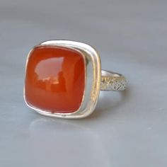 Materials: Sterling Silver, 14K Yellow Gold Fill, 14K Rose Gold Fill Gemstone: Orange Carnelian Gemstone Dimension : 12 mm Natural Orange Carnelian 925 Sterling Silver, 14K Yellow Gold Fill, 14K Rose Gold Fill Ring, Dainty Statement August Birthstone Ring Jewelry NEW 22 DEC ------------------------------------------------------------------------------------------------------------------------------------------------- Each gemstone jewelry displayed at my shop is available in all shapes & sizes, Heirloom Style Orange Ring For Gift, Heirloom Orange Ring For Gift, Heirloom Orange Ring As Gift, Classic Carnelian Jewelry For Anniversary, Carnelian Jewelry With Polished Finish For Weddings, Anniversary Carnelian Rings With Polished Finish, Carnelian Cabochon Jewelry For Anniversary, Amber Carnelian Rings For Anniversary, Carnelian Gemstone Rings For Anniversary