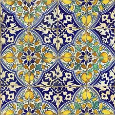 an artistic tile design with lemons and leaves on blue ground, in the style of portuguese tiles