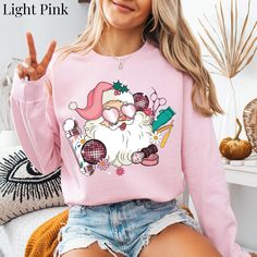 Barber Sweatshirt For Women Retro Pink Santa Sweater Girl Barber Sweatshirt Cute Barber Sweater Barber Christmas Gift Barber Xmas Sweatshirt Crewneck Pink Christmas >>ADDITIONAL DETAILS<< *Solid colors are made 50% cotton 50% polyester. Heather  colors - 60% polyester, 40% cotton. *Unisex Sizing- Runs True to Size *Relaxed Fit *The collar is ribbed knit, so it retains its shape even after washing.  *Designed & professionally printed in the USA *Products are DTG Printed (Direct To Garment) The ink is infused to fabric for long lasting wear. No vinyl is used. ***Custom Orders Are Available: Just send me a message.  *Production Times: Take 1-3 Business Days. *Shipping Times: Take 3-7 business days (usually only takes 2-4 business days) *Holiday times may take longer *Garment Care: Turn garmen Tech Christmas Gifts, Christmas Gift Nails, Santa Sweater, Christmas Gifts For Nurses, Pink Santa, Party Sweaters, Santa Sweatshirt, Nurse Sweatshirt, Usa Products