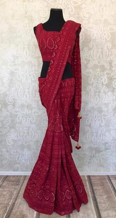 Saree Disclaimer: The actual product may vary slightly from the image. These are custom orders, hence expect slight variation in color, placement of the motif or buta. ESTIMATED DELIVERYBecause this is a custom order, it would take about 4 weeks from the date of purchase. RETURN POLICYThis product is a custom order and cannot be returned or exchanged. Festive Pre-draped Saree With Lace Work, Red Floor-length Pre-draped Saree For Wedding, Red Chikankari Embroidery Sharara For Reception, Designer Wedding Pre-draped Saree With Dupatta, Red Pre-draped Saree With Cutdana, Red Cutdana Pre-draped Fitted Saree, Red Fitted Pre-draped Saree With Cutdana, Fitted Red Pre-draped Saree With Cutdana, Red Georgette Sharara With Chikankari Embroidery