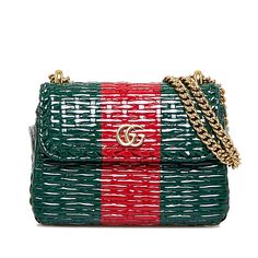 This Gucci GG Marmont Wicker is made from green and red rattan. It is  either crossbody or on the shoulder by the gold-tone chain strap and a front flap with magnetic closure. Structured Bag, Gucci Bamboo, Gucci Gg Marmont, Gg Marmont, Green And Red, Diaper Backpack, Green Bag, Bago, Magnetic Closure