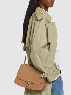 Height: 18cm Width: 26cm Depth: 7.5cm. Adjustable shoulder strap. Front flap with clasp closure. Logo detail Shoulder Bag Women, The Row, Sofia, Bags Women, Shoulder Strap, Shoulder Bag