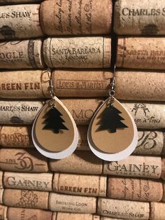 This is a listing for a pair of Christmas inspired faux leather earrings.  There are seven different choices to choose from. 1. White and Gold Teardrop with Tree - 2 3/4 inches drop length 2. White Plaid over White - 2 3/4 inches drop length 3. White Plaid over Red - 2 3/4 inches drop length 4. Green Stripes over Gold 2 1/2 inches drop length 5. Snowman - 2 1/4 inches drop length 6. Candy Canes - 2 1/2 inches drop length 7. Blue with Snowflakes - 2 3/4 inches drop length 8. Snowman with scarf - 2 3/4 inches drop length *The snowman with a scarf has a ribbon scarf* The weight of these earrings is very light, weighting up to .1 oz *due to the nature of the material, no two pair of earrings will look the same, and the design is one sided. Leather Christmas Earrings, Leather Earrings Christmas, Christmas Leather Earrings, Winter Faux Leather Earrings, Faux Leather Christmas Earrings, Christmas Faux Leather Earrings, Grinch Faux Leather Earrings, Christmas Tree Faux Leather Earrings, Buffalo Plaid Faux Leather Earrings