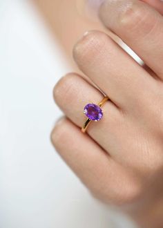 Our Dark Amethyst ring features a single deep purple genuine amethyst set in a four-prong setting on a 2mm gold vermeil band. A classic style that will stand the test of the time and is perfect for stacking. DETAILS * Dimension - Oval Stone - 8mm x 6mm Diameter, band width - 2mm * Materials - 18k thick gold vermeil over sterling silver, natural genuine dark purple amethyst stone * RING SIZER - If you have any questions about the stone or the ring size, please don't hesitate to send me a dm. If y Purple Engagement Rings, Purple Stone Rings, Dark Amethyst, Gold Amethyst Ring, Amethyst Set, Purple Amethyst Ring, Purple Rings, Amethyst Gold, Fancy Jewellery