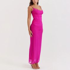 This elegant pink bodycon dress marries the structure and figure-flattering properties of corsetry with the delicate allure of sheer mesh, all while maintaining a light, ethereal aesthetic through its rose pink color and delicate spaghetti straps. It's a perfect choice for formal events, romantic evenings, or any occasion where making a stylish, impactful appearance is desired. Styling Tip:Heeled sandals or pumps in neutral colors like nude, white, or light pink can elongate the legs and complem Stylish Maxi Dress, Split Long Dress, Cami Midi Dress, Spaghetti Strap Maxi Dress, Lace Bustier, Bodycon Maxi Dresses, Sling Dress, Suspender Dress, Feminine Dress