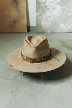 Americana – JW Bennett Rustic Adjustable Fedora, Adjustable Rustic Fedora, Adjustable Wide Brim Rustic Fedora, Rustic Adjustable Hats For Fall, Rustic Adjustable Brimmed Top Hat, Rustic Fitted Fedora With Flat Brim, Rustic Wide Brim Hat, Rustic Top Hat With Flat Brim For Country Events, Rustic Adjustable Felt Hat With Short Brim