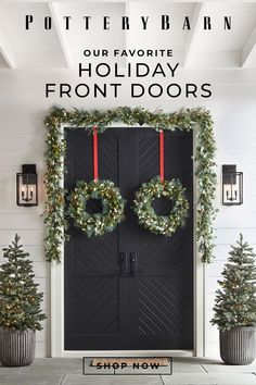 two wreaths are hanging on the front door