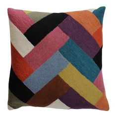 a multicolored pillow on a white background