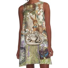 a women's dress with an image of alice and the wonderland tea party on it