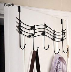 there is a coat rack with musical notes on it