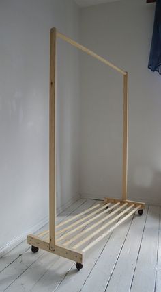 a bed frame sitting on top of a wooden floor