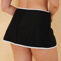 Stay cute and casual by the pool with the Contrast-Binding High-Waist Swim Skirt from Shade & Shore™. Made from nylon tricot fabric with spandex and recycled polyester lining, this high-waist swim skirt comes in black with contrasting white binding for chic look. Featuring a side-tie detail, it includes built-in shorts for medium coverage, offering comfort in and out of the water. Shade & Shore™: Made for the sun & fit for fun. Swim Skort, Tricot Fabric, High Waisted Swim, Swim Skirt, Swim Suit Bottoms, Cheeky Bikinis, Swimwear Fashion, Bike Shorts, Shorts With Pockets