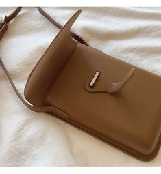 2022 Fall New Style. Your new go-to sling purse is here! Take it everywhere with you, chic, simple, lightweight, and durable. Material: High Quality Soft PU Leather Size: 14cm wide x 21cm tall x 3cm thick (5.5in x 8in x 1in) Designer Style ID: 8423 Chic Camera Leather Bag with Shoulder Strap, Women's Everyday Fashion Handbag Chic Solid Phone Bag For Travel, Versatile Solid Color Phone Bag For Daily Use, Classic Crossbody Phone Bag For Daily Use, Travel Shoulder Bag With Mobile Phone Holder, Crossbody Phone Bag For Everyday Use, Everyday Portable Crossbody Phone Bag, Chic Solid Phone Bag For Everyday Use, Everyday Solid Color Crossbody Phone Bag, Solid Color Travel Clutch Shoulder Bag