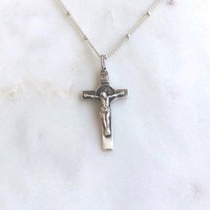 Sterling Silver St. Benedict Crucifix PLEASE NOTE: This item will now likely arrive after Christmas. Thank you! Solid sterling silver St. Benedict Crucifix on 18” silver chain. Crucifix is double sided and approximately 1” tall. Catholic Necklace, Crucifix Necklace, First Communion Gifts, St Benedict, Catholic Jewelry, Classic Gold, Jewelry Inspo, Metal Beads, Sterling Silver Pendants