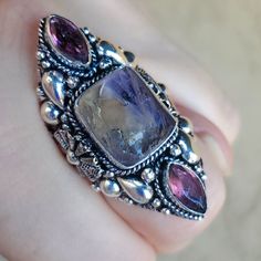 Brand New Handmade Oversized Rough Ametrine And Amethyst Silver Statement Ring. Size 9.75 925 Stamped New To Poshmark? Use Referral Code Kimberlyn222 To Receive $10. Unique Multi-stone Amethyst Ring, Silver Multi-stone Amethyst Ring, Silver Tanzanite Gemstones With Accents, Silver Amethyst Gemstones In Fusion Style, Unique Silver Amethyst Ring With Large Stone, Silver Fluorite Gemstone Jewelry, Bohemian Witch, Gold Belt Buckle, Fashion Rings Silver