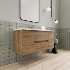 a bathroom with a sink, mirror and wooden cabinet in it's center area