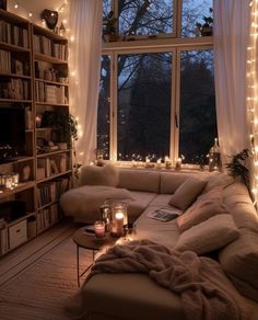 a living room filled with furniture and lots of lights on the windows sill above it