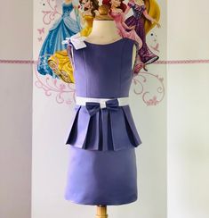 This beautiful interview dress with peplum, bow and  decoration on the shoulder.Zipper back.  Color: purple, lilac, lavender.Size 5-6 ( chest 24-25  waist  22-23  hips 30 length from shoulder to hem 25.5 ).Can  be made special for your little girl in any size and color. Elegant Dresses With Pleated Bodice For Dress-up, Elegant Dresses With Pleated Bodice For Formal Occasions, Purple Fitted Dress With Pleated Bodice, Fitted Purple Dress For Dress-up, Lavender Ruffled Formal Dress, Fitted Sleeveless Dress With Detachable Bow, Fitted Satin Dress With Detachable Bow, Purple Dresses With Pleated Fitted Bodice, Sleeveless Dresses With Satin Bow And Fitted Bodice