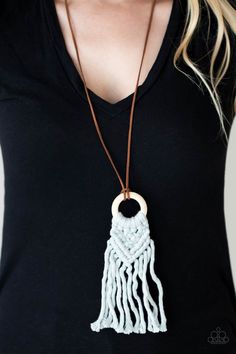 Strands of gray yarn-like thread delicately weaves into a knotted macrame pattern at the bottom of a white wooden hoop. Dainty strands of brown suede knot around the pendant for an earthy flair. Features an adjustable clasp closure.

Sold as one individual necklace. Includes one pair of matching earrings. Macrame Colar, Couture Necklace, Colorful Textiles, Long Silver Necklace, Wooden Hoop, Suede Tassel, Macrame Necklace, Paparazzi Accessories, Macrame Jewelry