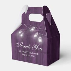 a purple bag with lights on it and the words, thank you charlotte & david