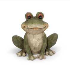 a statue of a frog sitting on the ground with eyes wide open and looking at the camera