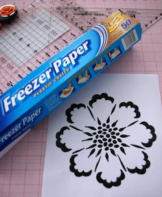 a piece of paper with a flower design on it