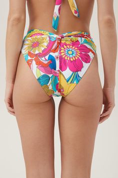 This high-waist swim bottom features a secure and stylish fit with moderate coverage, vibrant color, and a supportive, banded waistband with flattering rainbow stripes. Enjoy a beach day with ease in this vibrant, high-waist swim bottom. High-waist Wide, banded waistband Moderate coverage High cut leg Swim bottom only Swim tops and bottoms are sold separately Runs small; size up at least one size from your normal Trina Turk dress or pant size. See SIZE CHART Model is 5'10", wearing size 6 FABRIC Trina Turk Dresses, High Waisted Swim, Printed Swim, Swim Bottoms, Trina Turk, Rainbow Stripes, Swim Top, High Cut, Beach Day