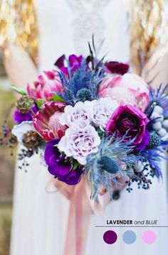 an image of a bride holding her wedding bouquet with purple, pink and white flowers