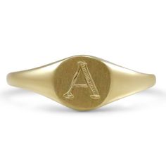 14k yellow gold signet ring with hand engraved initial. A-Z available under $500 Luxury Oval 14k Stamped Signet Ring, Luxury Round Signet Ring For Promises, Engraved Yellow Gold Signet Ring For Formal Occasions, Formal Engraved Yellow Gold Signet Ring, Elegant Yellow Gold Ring With Engraving Option, Classic Yellow Gold Engraved Round Ring, Gold 14k Stamped Signet Ring For Formal Occasions, Formal Gold 14k Stamped Signet Ring, Classic Yellow Gold Engraved Round Band Ring