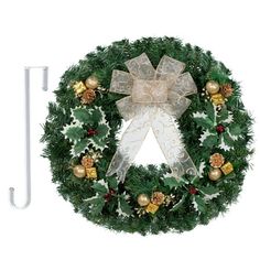 a christmas wreath and an umbrella on a white background