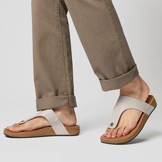 This refined take on our popular iQushion sandal, in soft leather with cork in the sole, is a versatile warm-weather staple – ideal for laidback weekends/holidays but smart enough for around the city or a relaxed workplace. A classic T-bar upper is set on a sleek sole. Leather linings and toe posts feel soft against your feet. With matt brushed-metal studs, and a debossed logo for subtle branding. On our featherlight pressure-diffusing iQushion™ midsole: ergonomically shaped, high-rebound, air-f Casual Adjustable Toe Post Footbed Sandals, Adjustable Toe Post Casual Footbed Sandals, Comfortable Cushioned Flip Flops For Everyday, Casual Leather Footbed Sandals With Arch Support, Casual Everyday Toe Post Flip Flops, Casual Leather Footbed Sandals With Cork-bed Midsoles, Casual Toe Post Flip Flops With Leather Footbed, Casual Toe Post Footbed Sandals With Textured Footbed, Casual Toe Post Sandals With Textured Footbed