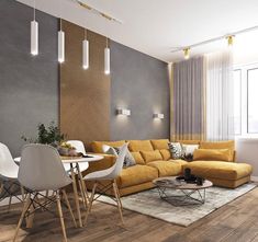 a living room filled with furniture next to a dining table and chairs on top of a hard wood floor