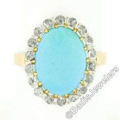 "Here we have a very lovely antique turquoise and diamond ring that was crafted in solid 18k gold with a platinum top during the Victorian era. It features a fine, Persian, oval cabochon cut turquoise stone neatly set at its center. The natural stone has a super attractive robin's egg blue color, and is wonderfully complemented by a halo of 18 old rose cut diamonds, adding a glamorous touch with their brilliant sparkles. This ring remains in all original and excellent physical condition with pat Antique Oval Turquoise Ring Hallmarked, Oval Turquoise Ring In Yellow Gold With Diamond, Antique Oval Turquoise Ring, Formal Oval Turquoise Ring With Diamond, Oval Diamond Turquoise Ring For Formal Occasions, Antique Turquoise Cabochon Ring For Wedding, Antique Style Turquoise Wedding Ring With Cabochon, Antique Oval Turquoise Wedding Ring, Antique Oval Turquoise Ring For Wedding