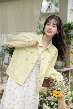 Fun light yellow denim jacket with embroidered daisies flying around. Regular low waist/hip length with side pockets and faux chest pocket flaps. S: 21.5" across shoulders, 45" chest, 20" lengthM: 22" across shoulders, 46.5" chest, 20.5" lengthL: 22.5" across shoulders, 48" chest, 21" length Yellow Cotton Denim Jacket With Pockets, Summer Casual Denim Jacket With Floral Embroidery, Yellow Spring Outerwear With Pockets, Casual Summer Denim Jacket With Floral Embroidery, Casual Floral Embroidered Denim Jacket For Summer, Spring Yellow Outerwear With Pockets, Casual Denim Jacket With Floral Embroidery For Summer, Yellow Denim Jacket With Pockets For Fall, Casual Yellow Denim Jacket With Pockets